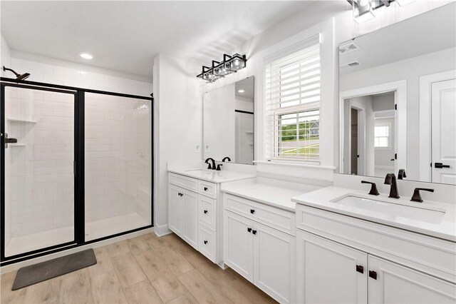 107 Abigail Dr, Adams Twp, PA 16046 - full bath featuring vanity, a stall shower, wood finished floors, and recessed lighting