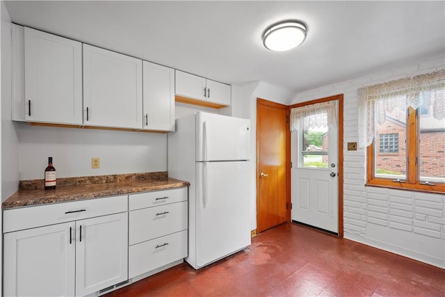 138 Link Ave, Ross Twp, PA 15237 - kitchen featuring freestanding refrigerator, white cabinetry, and dark floors