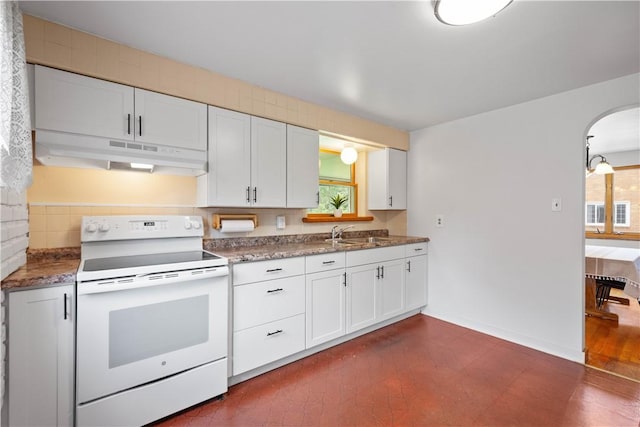 138 Link Ave, Ross Twp, PA 15237 - kitchen with electric range, under cabinet range hood, arched walkways, white cabinetry, and stone countertops