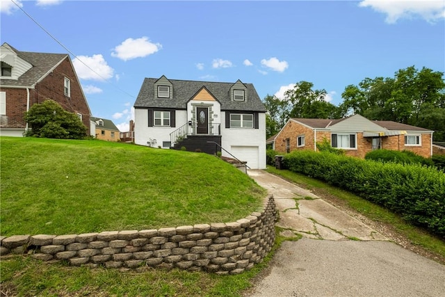 746 Agnew Rd, Baldwin Boro, PA 15227 - view of front facade with concrete driveway, a garage, and a front yard