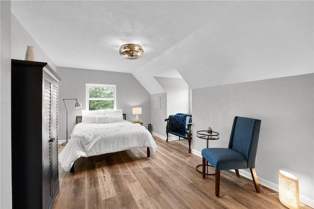 746 Agnew Rd, Baldwin Boro, PA 15227 - bedroom featuring wood finished floors and vaulted ceiling
