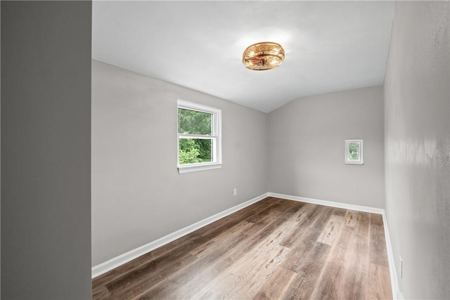 746 Agnew Rd, Baldwin Boro, PA 15227 - spare room featuring wood finished floors and vaulted ceiling