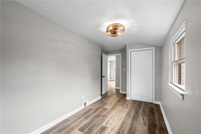 746 Agnew Rd, Baldwin Boro, PA 15227 - unfurnished bedroom with wood finished floors, a closet, and lofted ceiling