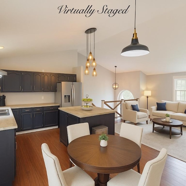 109 Remil Dr, Twp Of But Se, PA 16001 - dining room with lofted ceiling and dark wood-style flooring