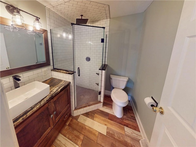 109 Remil Dr, Twp Of But Se, PA 16001 - bathroom featuring vanity, a stall shower, and wood finished floors