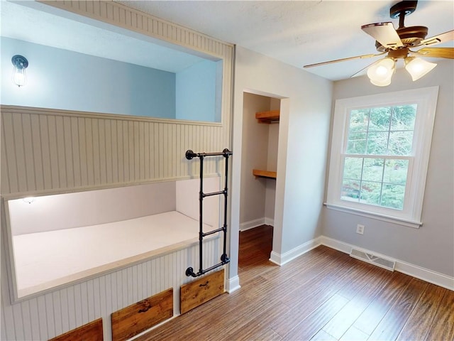 109 Remil Dr, Twp Of But Se, PA 16001 - unfurnished bedroom featuring wood finished floors, a spacious closet, a ceiling fan, and a closet