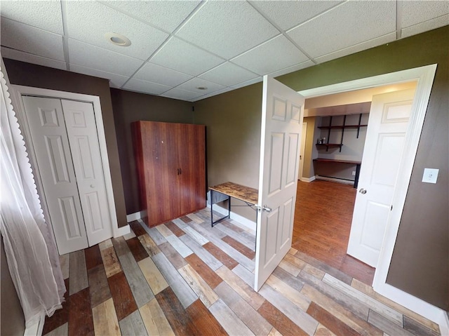 109 Remil Dr, Twp Of But Se, PA 16001 - hall with a drop ceiling, light wood-style floors, and a baseboard heating unit