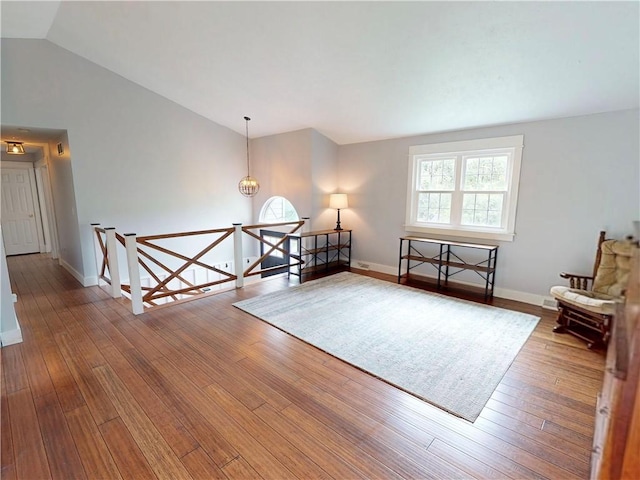 109 Remil Dr, Twp Of But Se, PA 16001 - sitting room featuring an upstairs landing, vaulted ceiling, wood-type flooring, and a chandelier