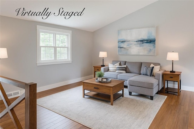 109 Remil Dr, Twp Of But Se, PA 16001 - living room with wood-type flooring and lofted ceiling