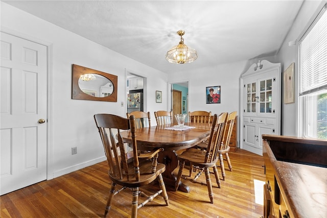 221 Springer, Moon/Crescent Twp, PA 15108 - dining space featuring light wood-type flooring and a chandelier