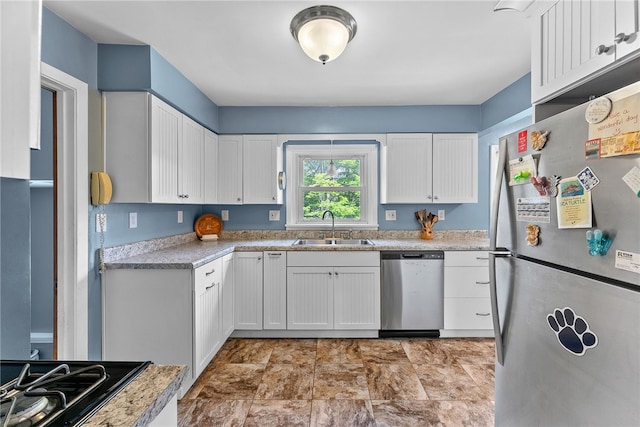 221 Springer, Moon/Crescent Twp, PA 15108 - kitchen featuring appliances with stainless steel finishes, white cabinets, and light countertops