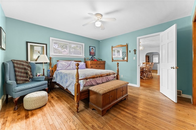 221 Springer, Moon/Crescent Twp, PA 15108 - bedroom featuring arched walkways, light wood-style floors, and ceiling fan