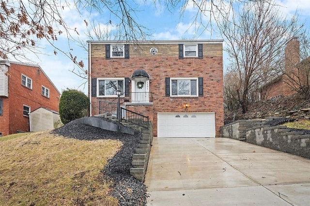 1171 Arrowood Dr, Mt Lebanon, PA 15243 - view of front of property with a garage, brick siding, and driveway