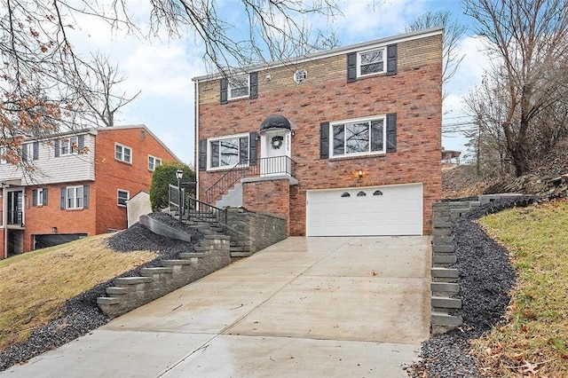1171 Arrowood Dr, Mt Lebanon, PA 15243 - view of property featuring a garage, driveway, and brick siding