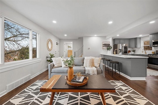 1171 Arrowood Dr, Mt Lebanon, PA 15243 - living area with stairway, recessed lighting, and dark wood-style floors
