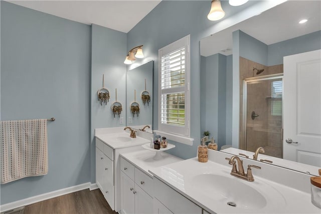 2005 Lampl Ln, Penn Twp Wml, PA 15644 - full bath featuring double vanity, tiled shower, and wood finished floors