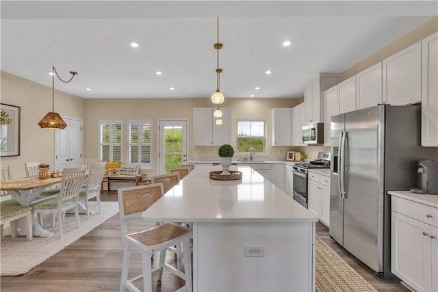 2005 Lampl Ln, Penn Twp Wml, PA 15644 - kitchen featuring appliances with stainless steel finishes, light countertops, white cabinetry, and recessed lighting