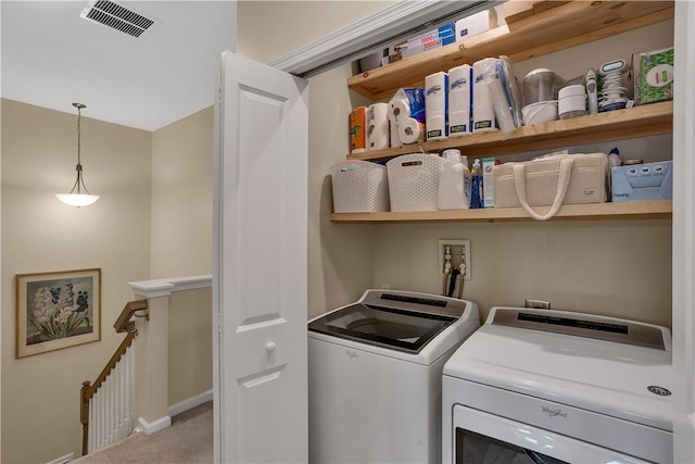 2005 Lampl Ln, Penn Twp Wml, PA 15644 - laundry room featuring independent washer and dryer and carpet floors
