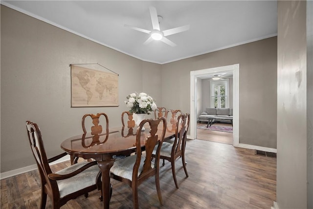3103 Shadeland Ave, Brighton Heights, PA 15212 - dining area featuring ornamental molding, wood finished floors, and a ceiling fan