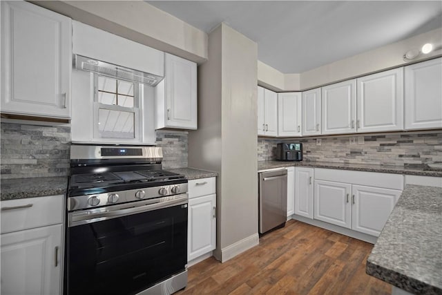 3103 Shadeland Ave, Brighton Heights, PA 15212 - kitchen featuring appliances with stainless steel finishes, white cabinetry, decorative backsplash, and dark wood-style floors