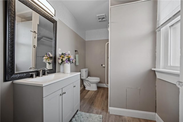 3103 Shadeland Ave, Brighton Heights, PA 15212 - full bath with vanity, wood finished floors, and a shower