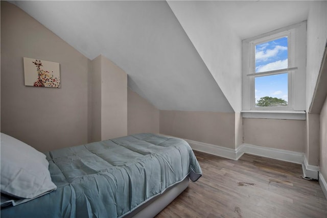 3103 Shadeland Ave, Brighton Heights, PA 15212 - bedroom with vaulted ceiling and wood finished floors