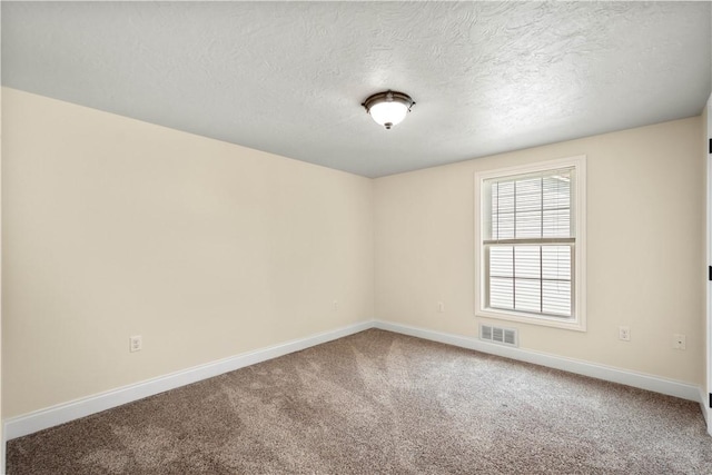 445/447 Georgetown Rd, Cecil, PA 15055 - carpeted spare room featuring baseboards and a textured ceiling
