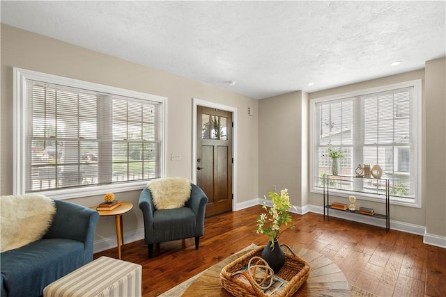 445/447 Georgetown Rd, Cecil, PA 15055 - living room with healthy amount of natural light, wood-type flooring, a textured ceiling, and recessed lighting