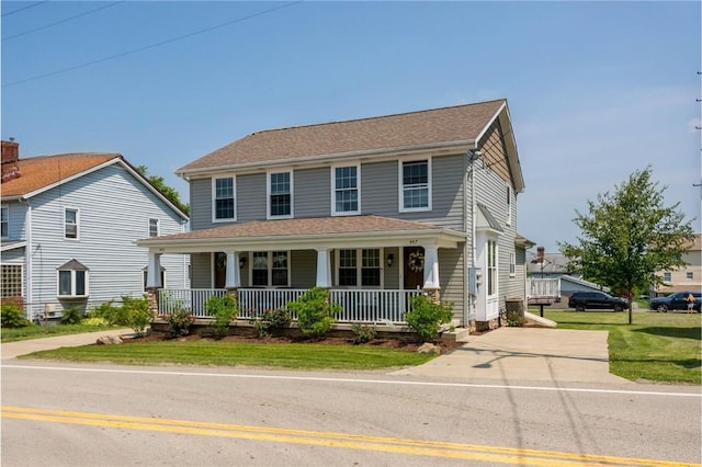 445/447 Georgetown Rd, Cecil, PA 15055 - view of front of property with a porch, a front yard, and driveway