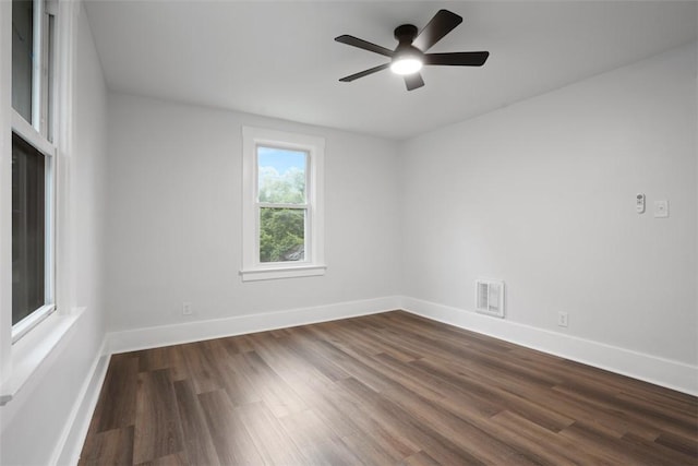 1341 4th Ave, Coraopolis, PA 15108 - empty room with dark wood finished floors and a ceiling fan