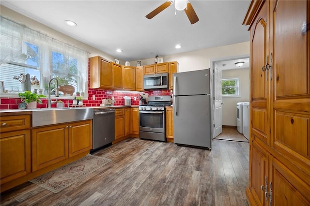 237 Prichard Ave, Centerville, PA 15358 - kitchen featuring stainless steel appliances, washer and dryer, a ceiling fan, brown cabinetry, and recessed lighting
