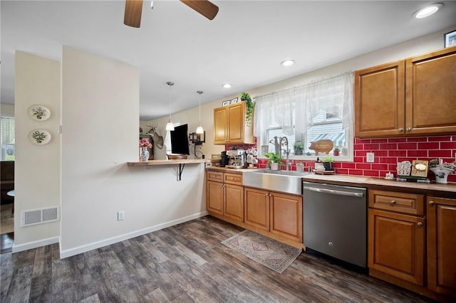 237 Prichard Ave, Centerville, PA 15358 - kitchen with stainless steel dishwasher, dark wood-style flooring, ceiling fan, backsplash, and decorative light fixtures