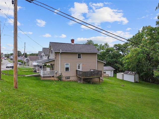 237 Prichard Ave, Centerville, PA 15358 - back of property featuring a shed, a lawn, a chimney, and a wooden deck