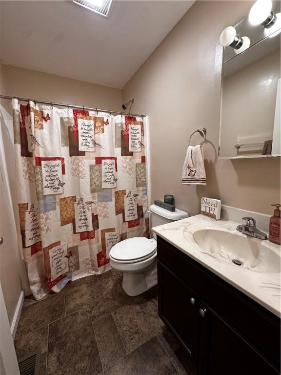 bathroom featuring vanity and a shower with curtain