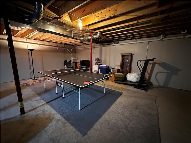 playroom with unfinished concrete floors