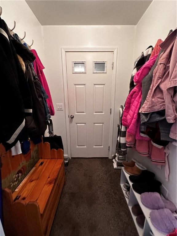 6209 Old Rte 8, Penn Twp, PA 16002 - mudroom featuring dark carpet