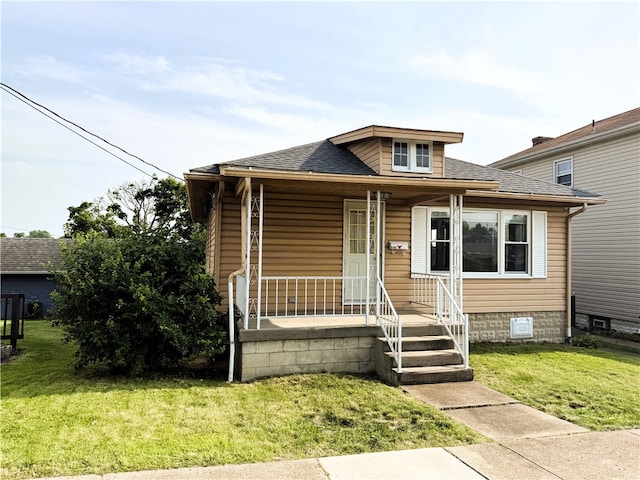 648 Jack St, City Of Greensburg, PA 15601 - bungalow with a porch, a front yard, and a shingled roof