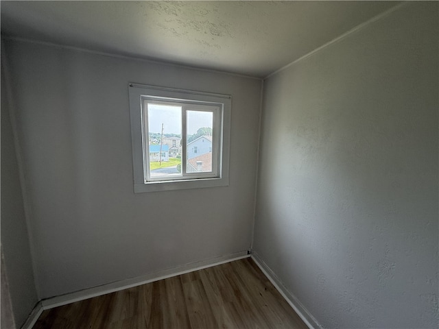 648 Jack St, City Of Greensburg, PA 15601 - spare room with dark wood-style floors and baseboards