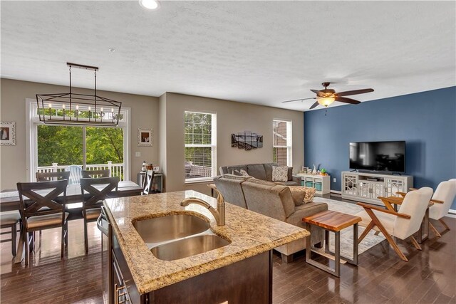 2278 Flint Dr, South Strabane, PA 15301 - living area with dark wood-style flooring, a ceiling fan, a textured ceiling, and recessed lighting