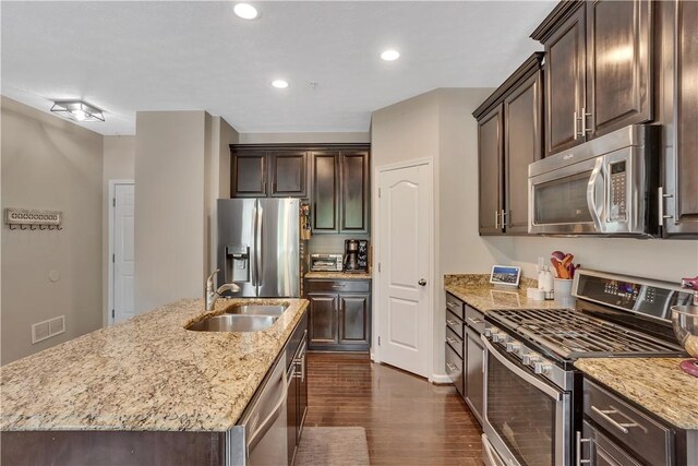 2278 Flint Dr, South Strabane, PA 15301 - kitchen featuring appliances with stainless steel finishes, dark brown cabinets, and recessed lighting