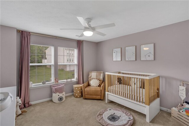 2278 Flint Dr, South Strabane, PA 15301 - carpeted bedroom featuring a crib and ceiling fan