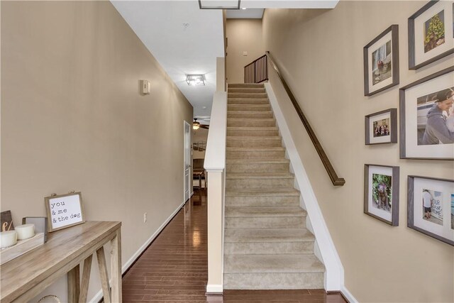 2278 Flint Dr, South Strabane, PA 15301 - staircase with wood finished floors and baseboards