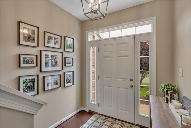 2278 Flint Dr, South Strabane, PA 15301 - entrance foyer featuring plenty of natural light, a chandelier, and dark wood-type flooring