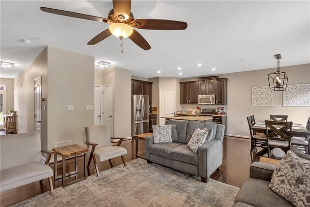 2278 Flint Dr, South Strabane, PA 15301 - living area with wood finished floors, ceiling fan, and recessed lighting