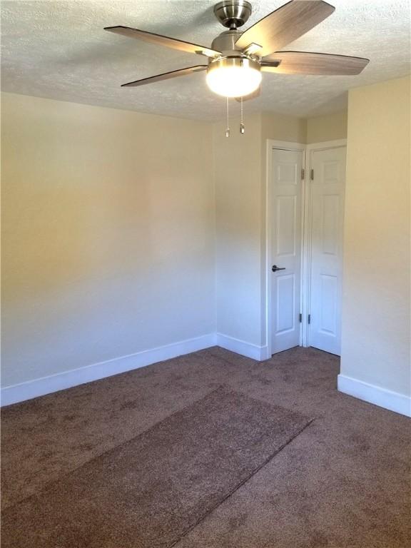 2807 Middle Rd, Hampton, PA 15116 - empty room with a textured ceiling, carpet, and ceiling fan