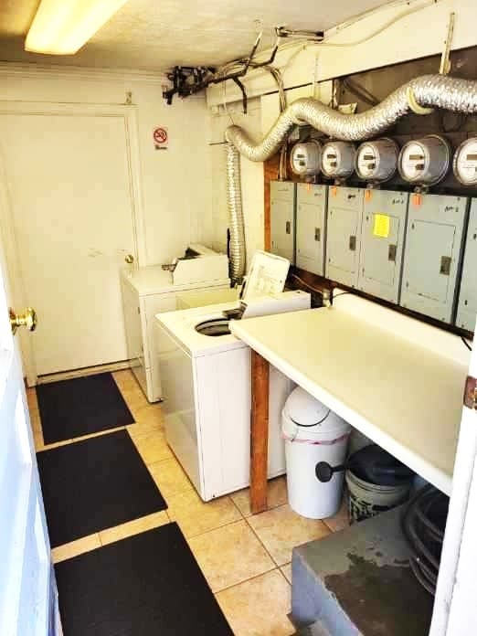 2807 Middle Rd, Hampton, PA 15116 - laundry room with light tile patterned floors