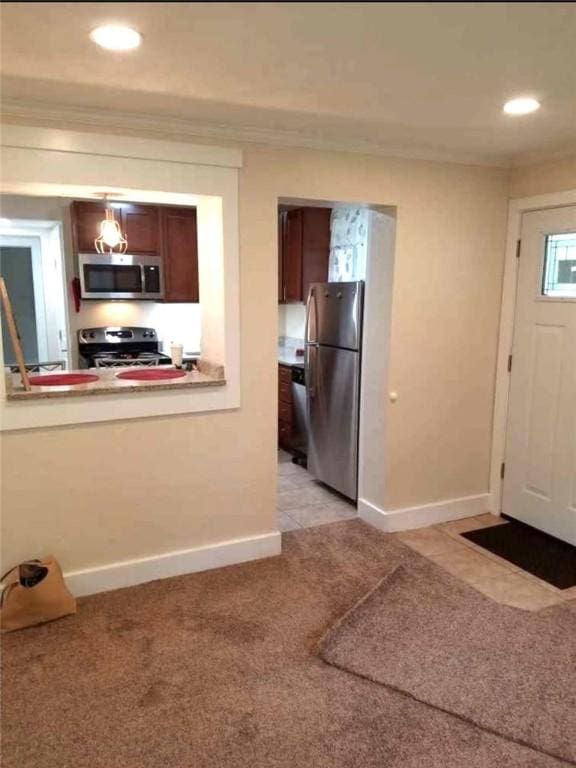 2807 Middle Rd, Hampton, PA 15116 - kitchen featuring appliances with stainless steel finishes, light carpet, recessed lighting, ornamental molding, and light tile patterned floors