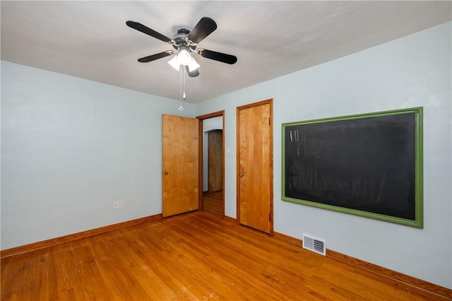 1833 Allison Ave, Mccandless, PA 15101 - unfurnished bedroom featuring light wood finished floors and a ceiling fan