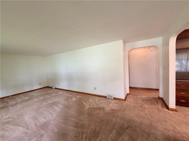 7 E Sheridan Ave, New Castle/1St, PA 16105 - spare room featuring arched walkways and carpet floors