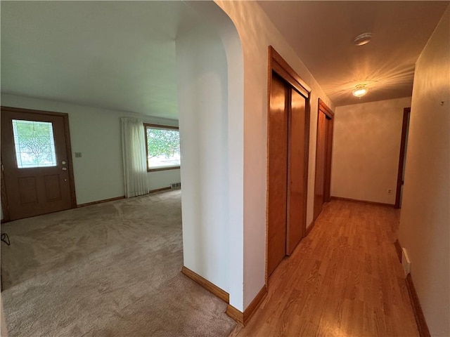 7 E Sheridan Ave, New Castle/1St, PA 16105 - hallway featuring arched walkways and light wood-style floors